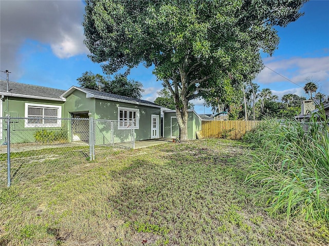 exterior space featuring a yard and a patio