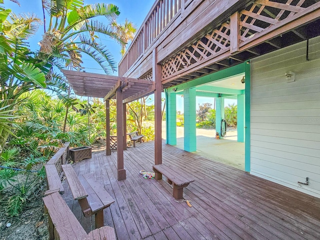 wooden terrace with a pergola