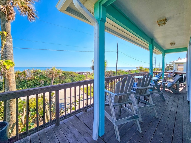 wooden terrace with a water view