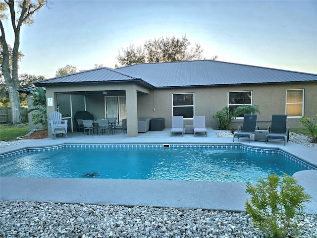 view of pool featuring a patio area