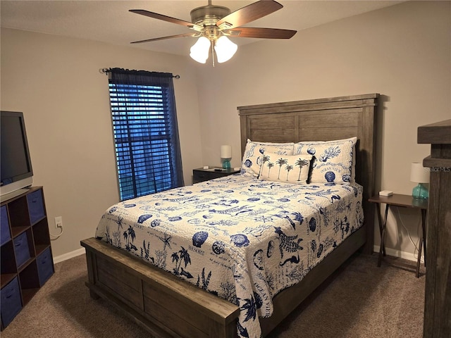 bedroom featuring dark colored carpet and ceiling fan