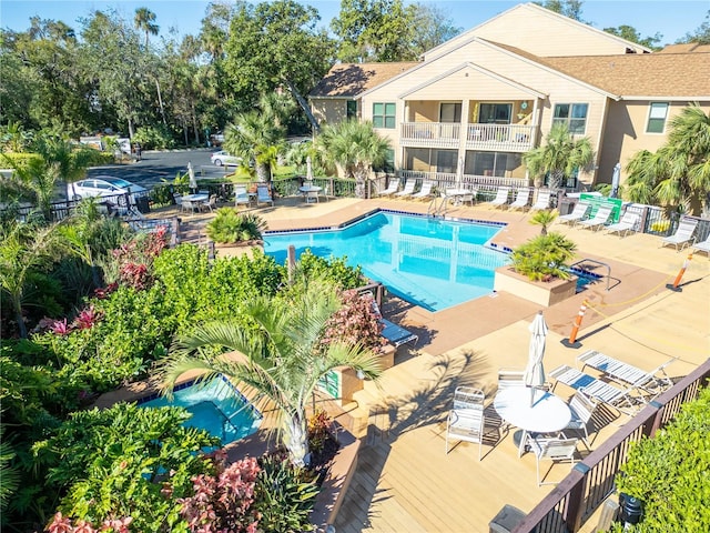 view of pool featuring a wooden deck