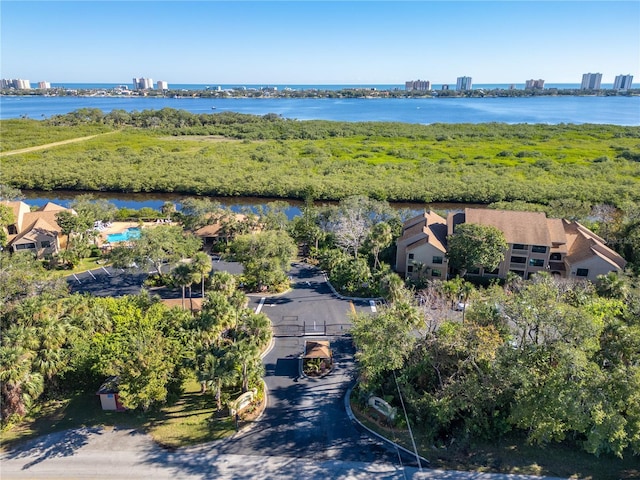 birds eye view of property featuring a water view