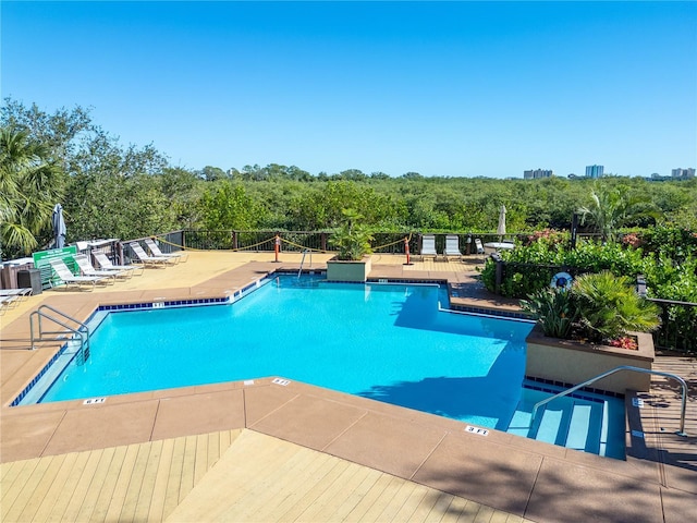 view of pool featuring a patio