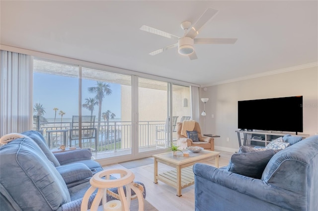 living room with ceiling fan, light hardwood / wood-style floors, and ornamental molding