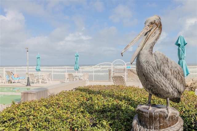 surrounding community with a water view