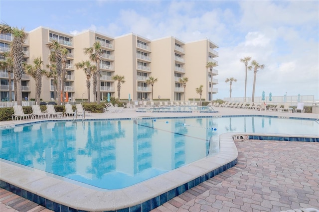 2401 S Atlantic Ave Unit C206, New Smyrna Beach, FL 32169 - community pool with a patio