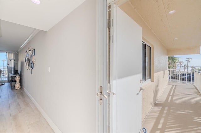 2401 S Atlantic Ave Unit C206, New Smyrna Beach, FL 32169 - hall with recessed lighting and crown molding