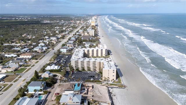 aerial view with a view of the beach and a water view