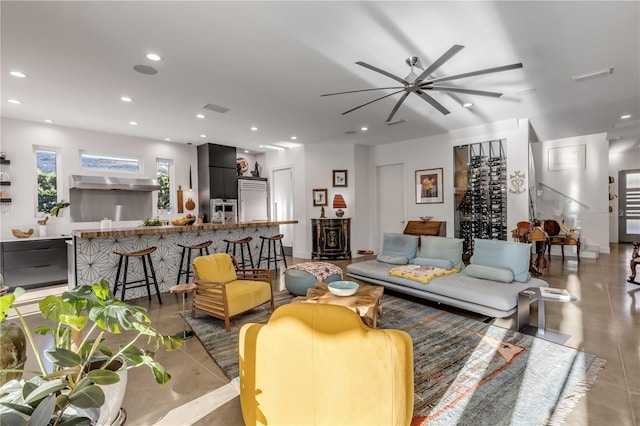 living room featuring ceiling fan