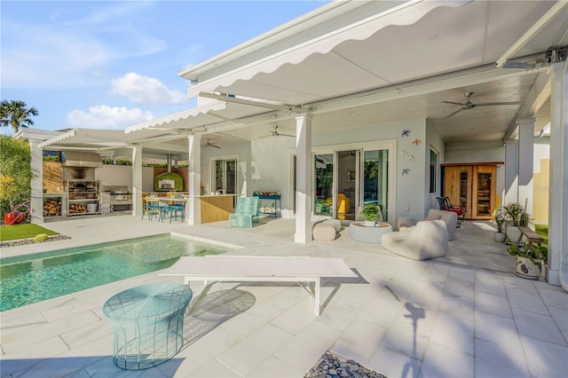 rear view of property with a patio area, french doors, exterior kitchen, and an outdoor bar