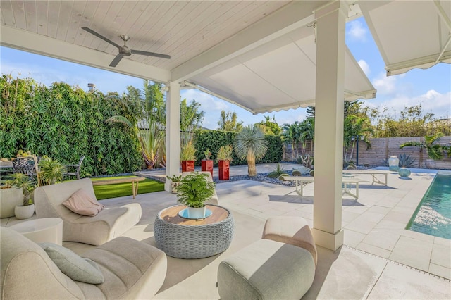 view of patio with ceiling fan and an outdoor hangout area