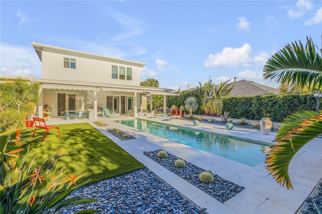 view of pool featuring a patio