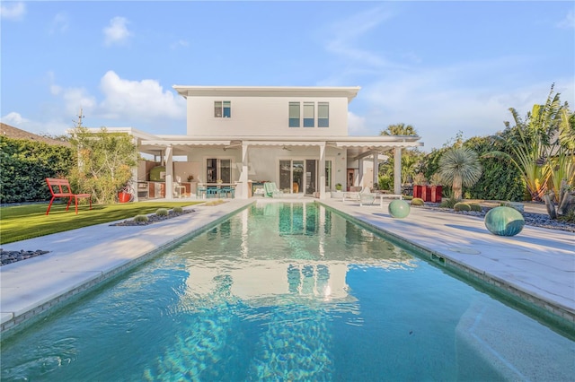 view of swimming pool with a pergola, a patio area, and a yard