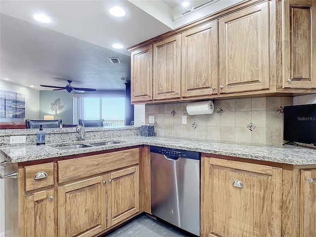 5300 S Atlantic Ave Unit 17-506, New Smyrna Beach, FL 32169 - kitchen with stainless steel dishwasher, a ceiling fan, a peninsula, light stone counters, and tasteful backsplash