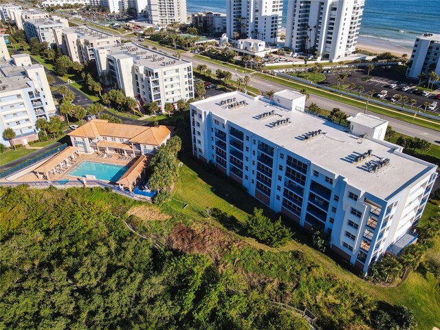 drone / aerial view with a view of the beach and a water view