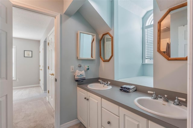 bathroom featuring vanity and a textured ceiling