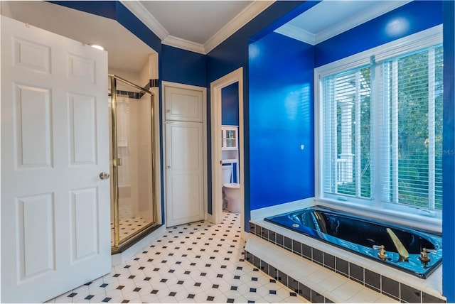 bathroom featuring toilet, independent shower and bath, and crown molding