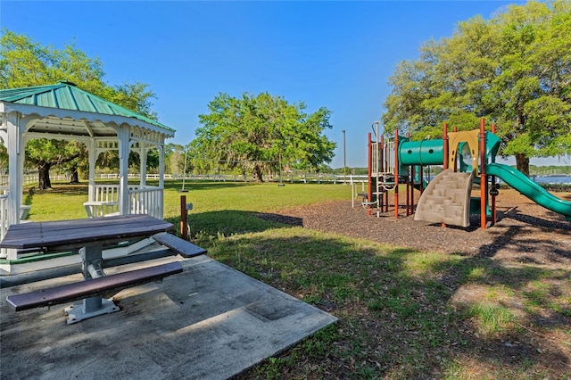 exterior space featuring a gazebo and a lawn