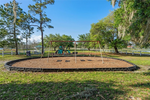 view of playground featuring a lawn