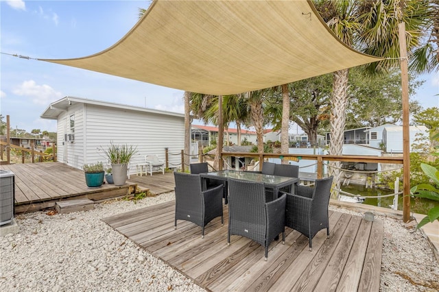 deck featuring a water view