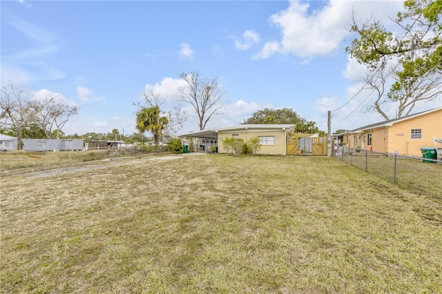 view of yard featuring a carport