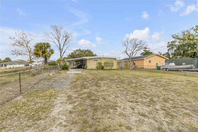 view of yard featuring a carport