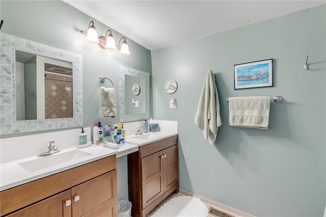 bathroom with vanity and walk in shower