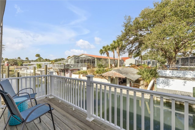 wooden deck with a water view