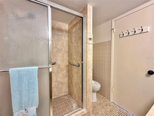 bathroom with tile patterned floors, an enclosed shower, and toilet