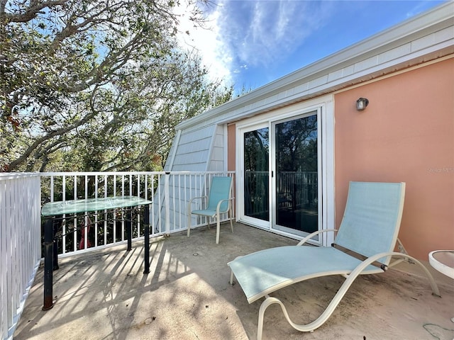 view of patio / terrace with a balcony