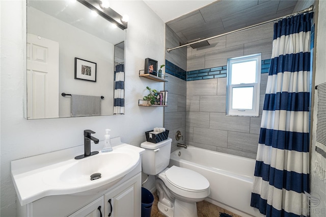 full bathroom featuring vanity, toilet, and shower / tub combo with curtain