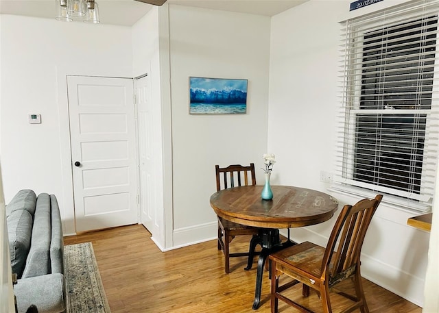 dining room with light wood-type flooring