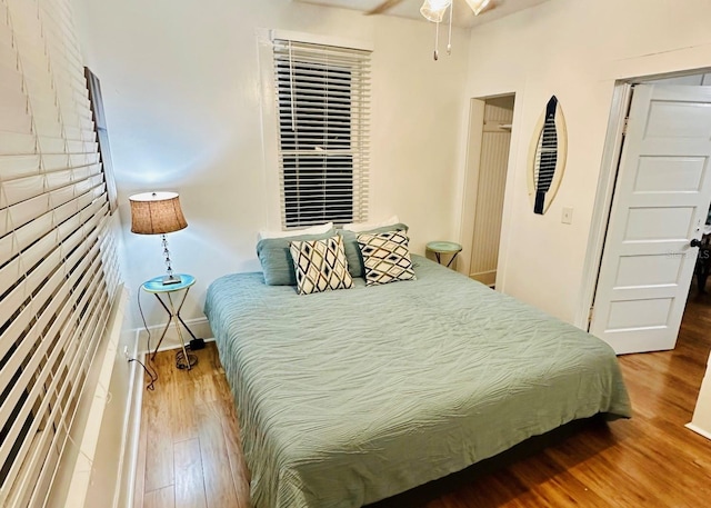 bedroom featuring hardwood / wood-style floors