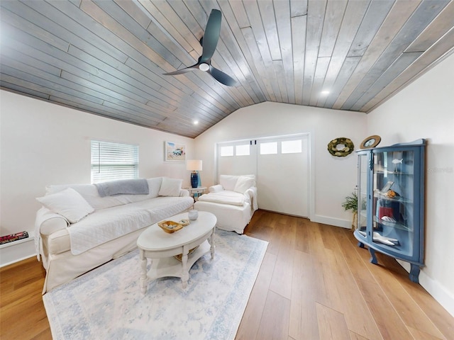 living room featuring lofted ceiling, light hardwood / wood-style floors, ceiling fan, and wooden ceiling