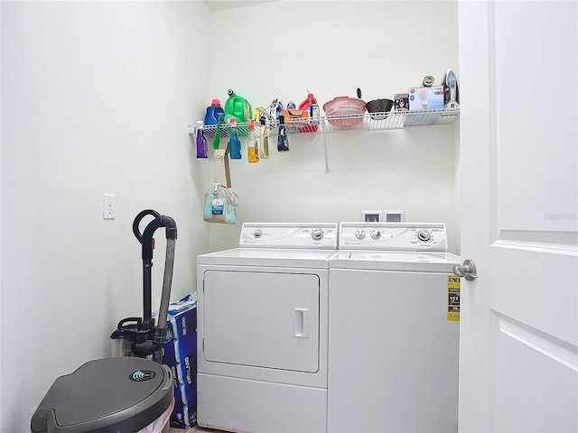 laundry room featuring laundry area and separate washer and dryer