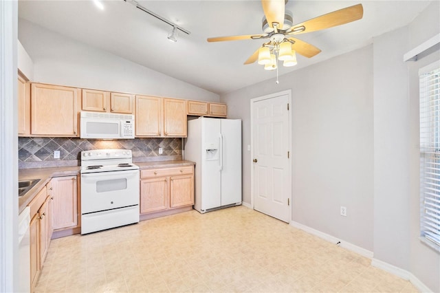 kitchen with light brown cabinets, lofted ceiling, white appliances, decorative backsplash, and ceiling fan