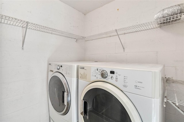 laundry area featuring separate washer and dryer