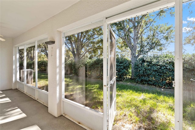 unfurnished sunroom with a wealth of natural light