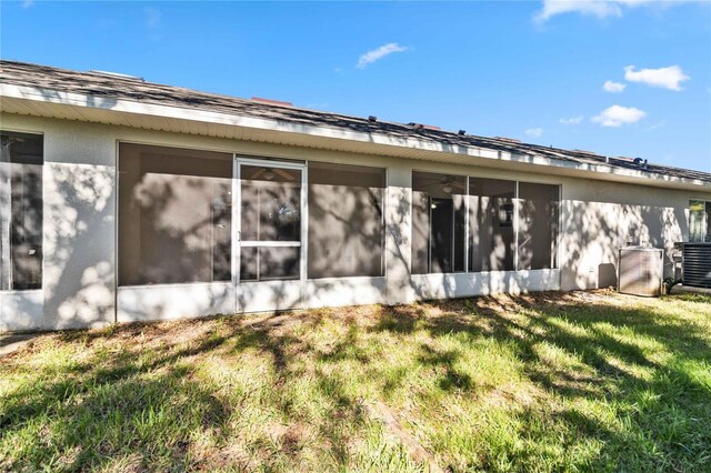 view of property exterior with a yard