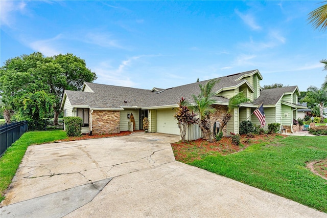 ranch-style house with a garage and a front lawn