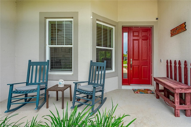 property entrance featuring covered porch