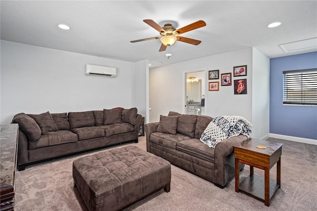 carpeted living room with ceiling fan, a textured ceiling, and a wall mounted AC