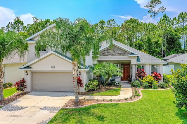 view of front of house featuring a front yard and a garage