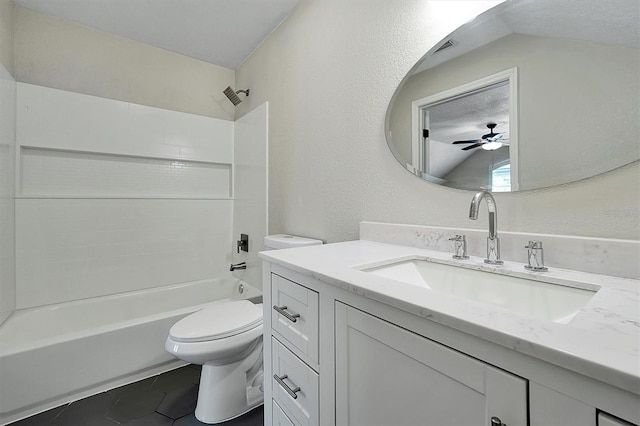 full bathroom featuring shower / bathing tub combination, ceiling fan, vanity, and toilet