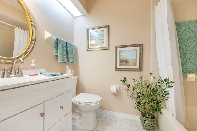 bathroom with tile patterned floors, vanity, and toilet