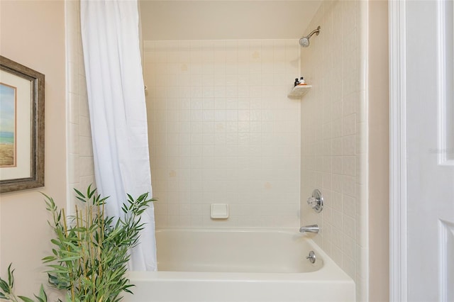 bathroom featuring shower / bathtub combination with curtain