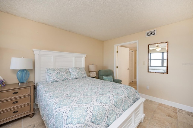 bedroom with a textured ceiling