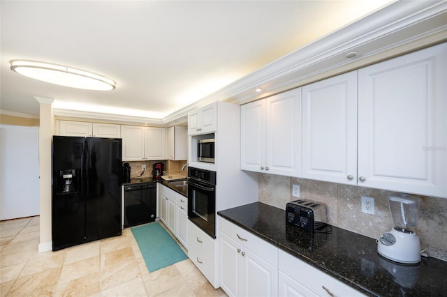 kitchen featuring white cabinets, decorative backsplash, crown molding, and black appliances