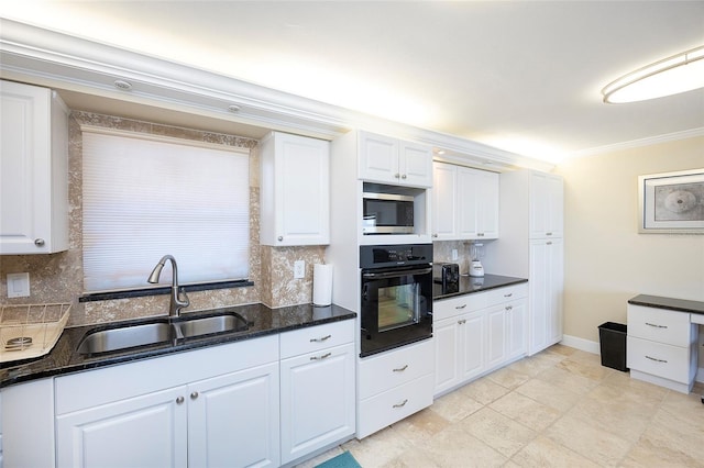 kitchen featuring white cabinets, black oven, ornamental molding, and sink